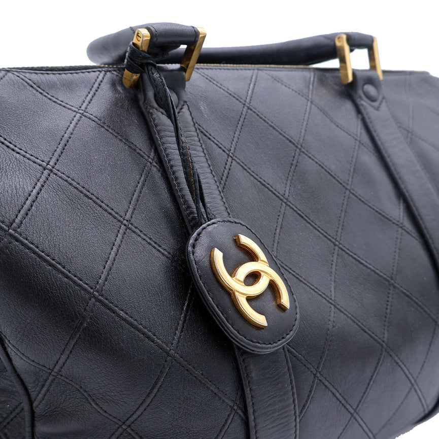 CHANEL QUILTED DUFFLE BAG
